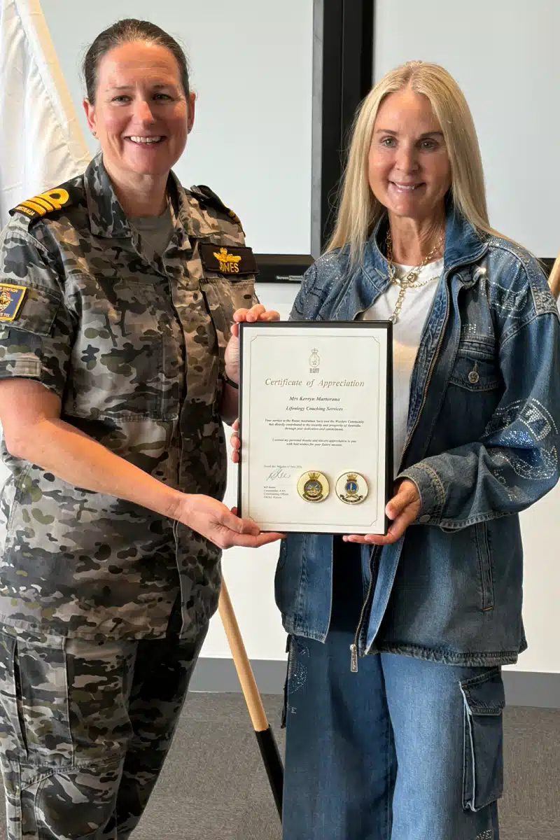 Lifeology receiving a certificate from Royal Australian Navy